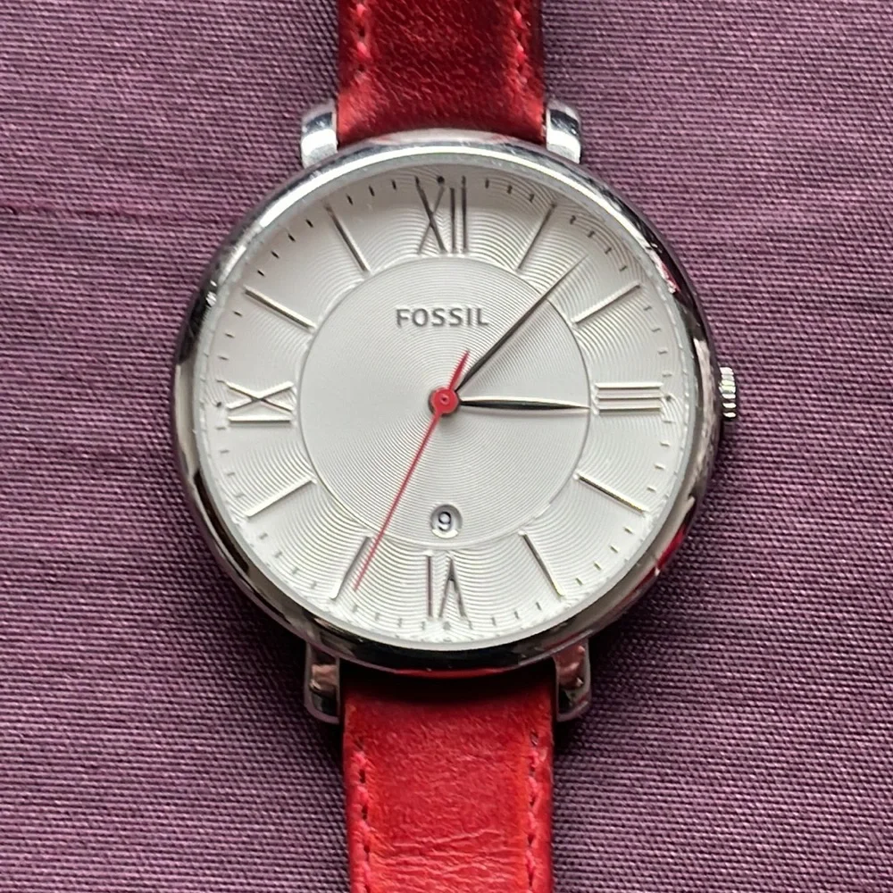 Fossil Watch with Roman numbers and date.